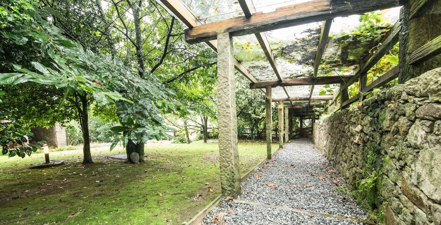 Porche y jardín · Casa Perfeuto María