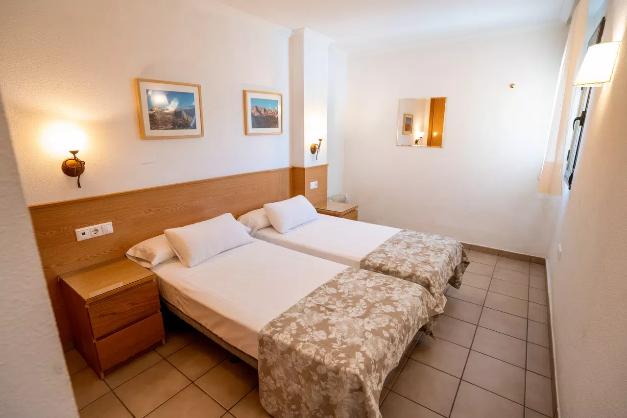 Dormitorio · Apartamentos Serrella