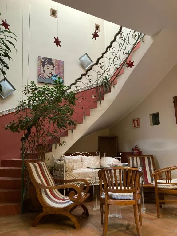 Salón y patio interior · Casa Rural Valdevilano