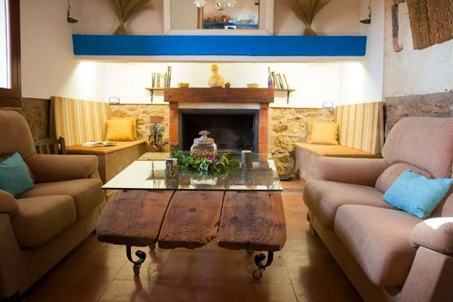 Salón con chimenea · Casa Rural La Huerta El Bao