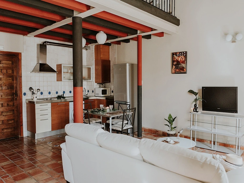 Cocina y zona de estar · Apartamentos con Encanto Señorío de Haro