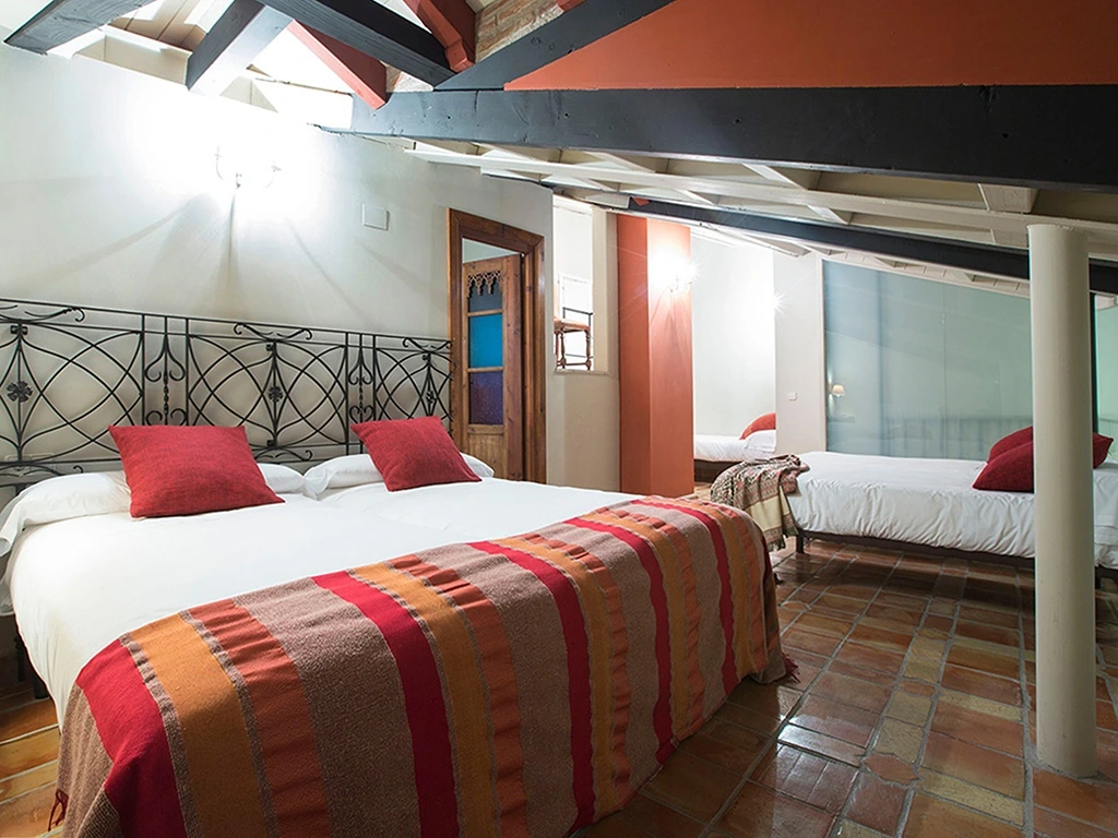 Dormitorio de un apartamento · Apartamentos con Encanto Señorío de Haro