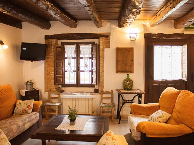 Salón con chimenea · Casa Azul de la Ribera del Duero