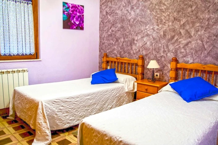 Dormitorio con camas individuales · El Crisal