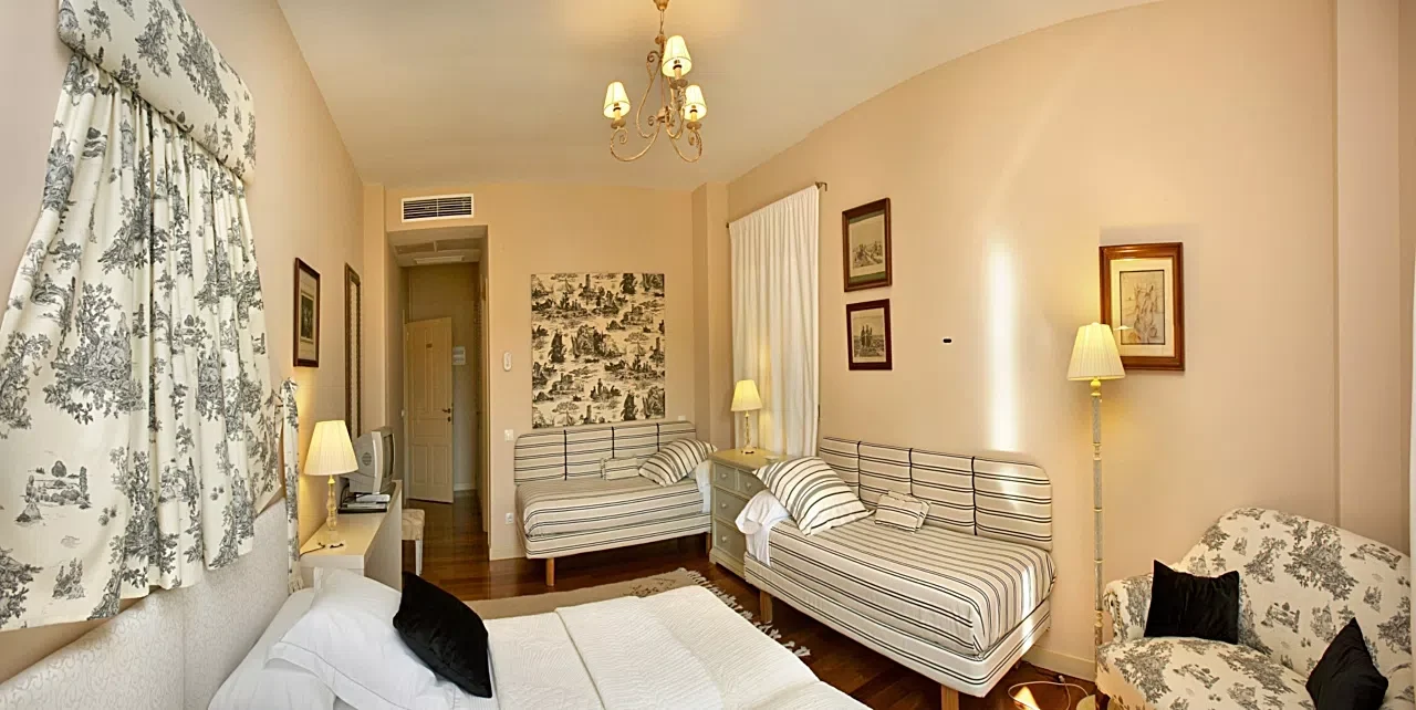 Zona de estar del apartamento junior · Hotel Santa Coloma del Camino