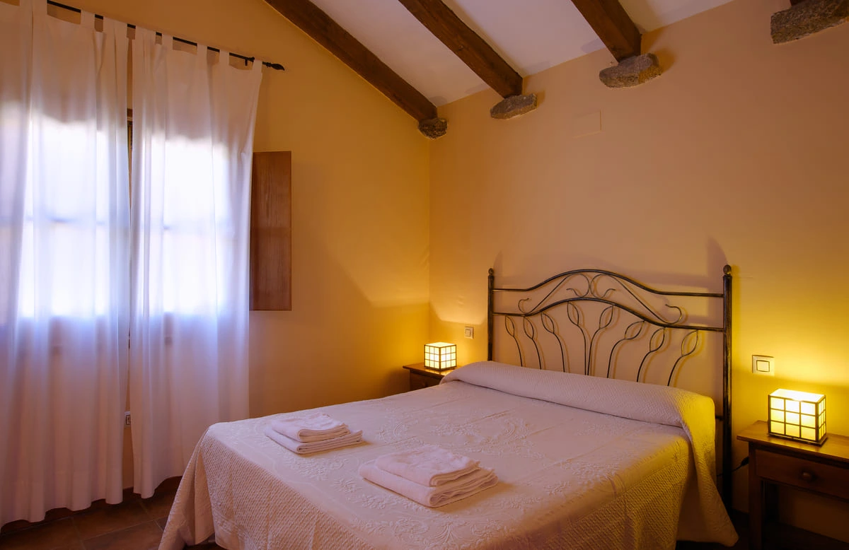 Dormitorio de una de las casas · Casas Rurales Acebuche