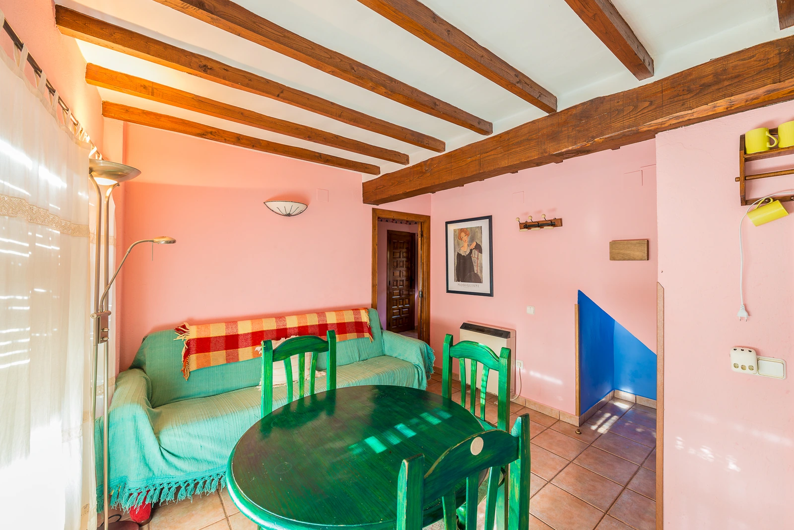Salón y comedor del apartamento Zarzamora de Casa Manadero · Apartamentos Rurales Casa Manadero