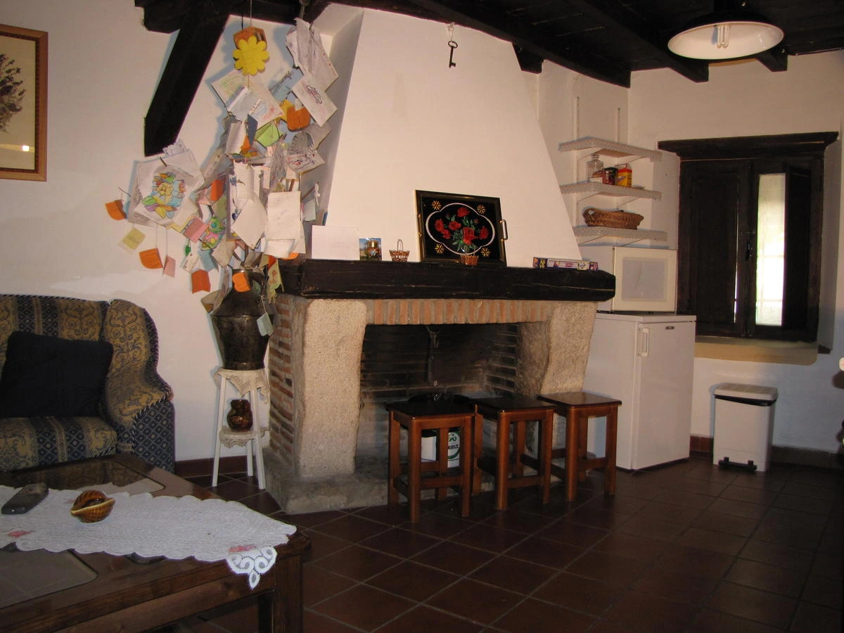 Salón con chimenea · La Casa de Tía Emilia