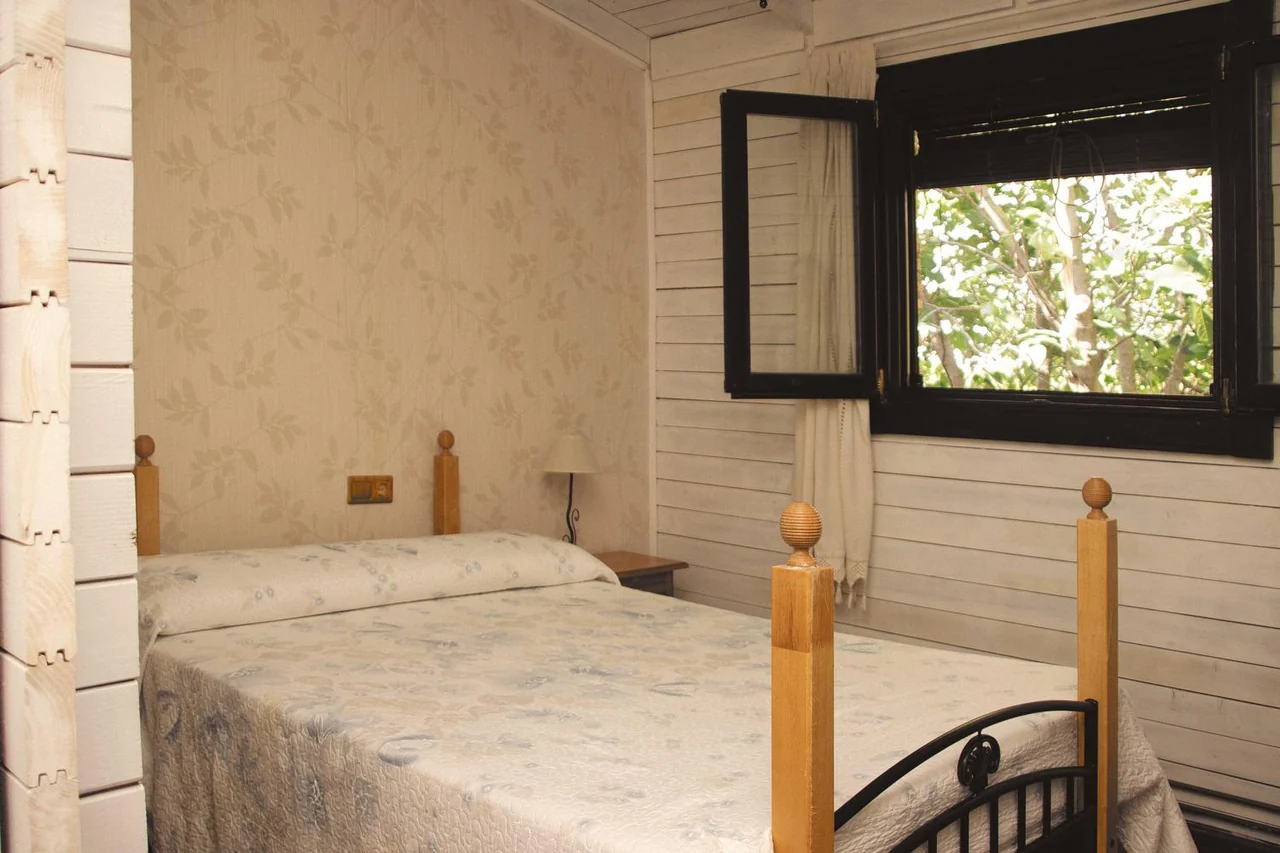 Dormitorio de la casa de madera · Mirador Los Cotos