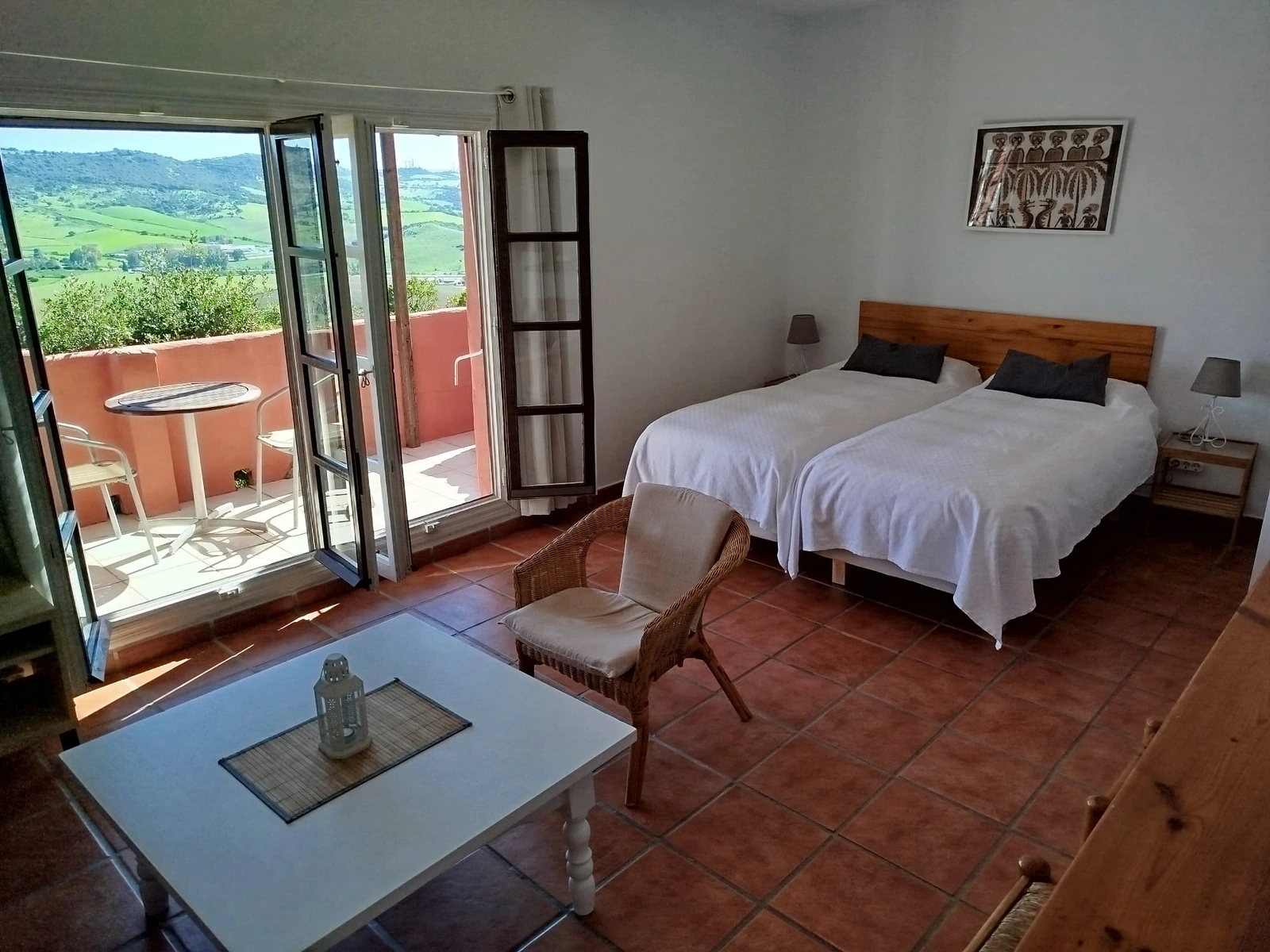 Estudio Jacaranda: dormitorio y zona de estar · Casa Montecote