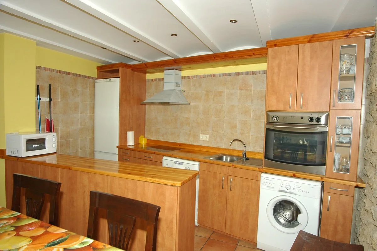 Cocina equipada con comedor · Casa Camí Real