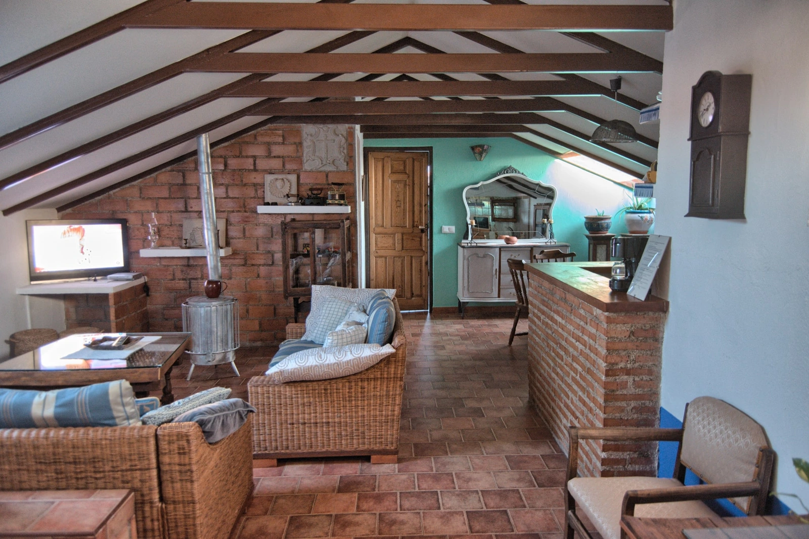 Sala de estar de Suite Junior / apartamento abuhardillado · Posada Abuela Fidela