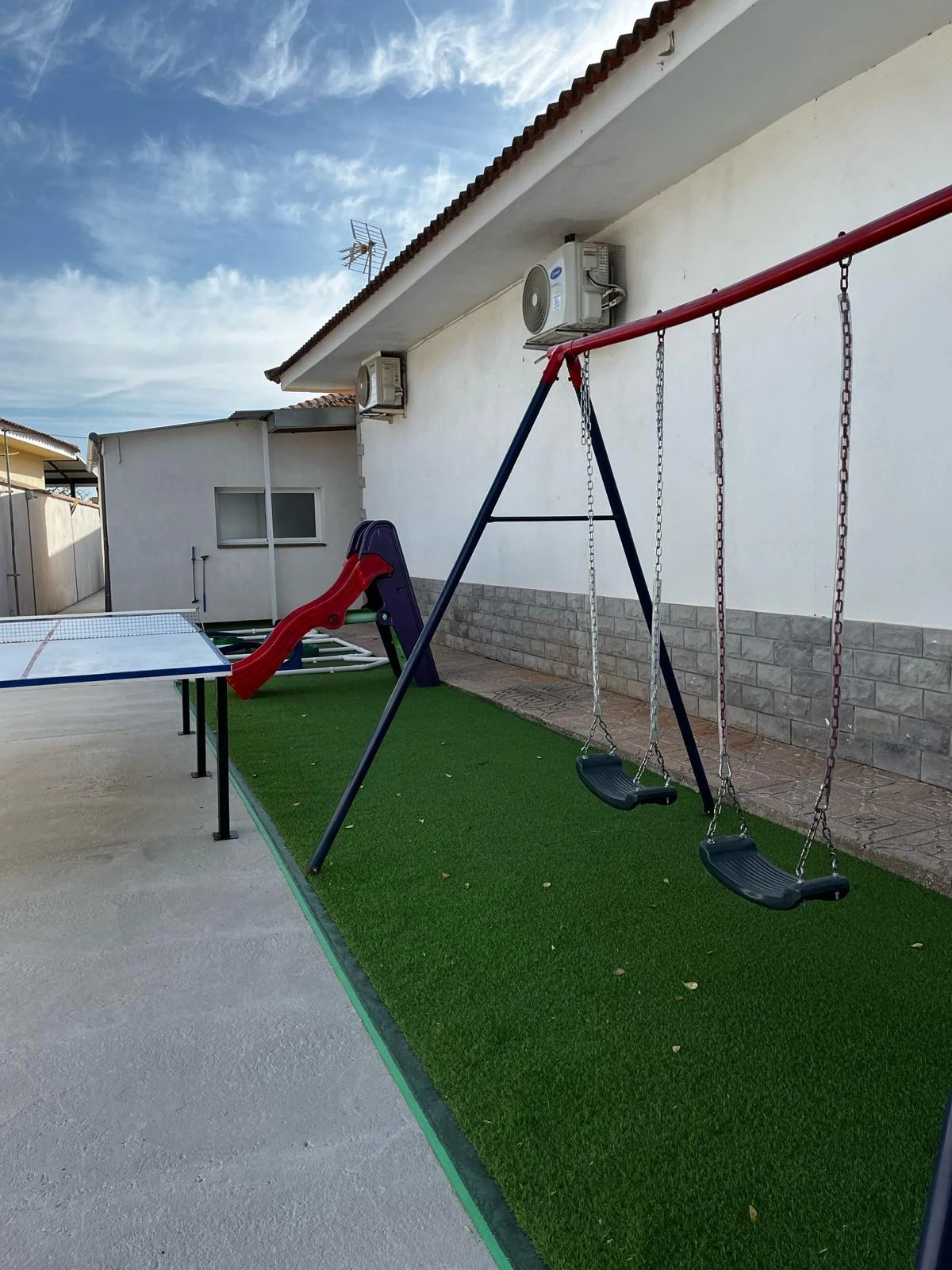 Zona de juegos infantiles exterior de Casa Rural Tobarejos