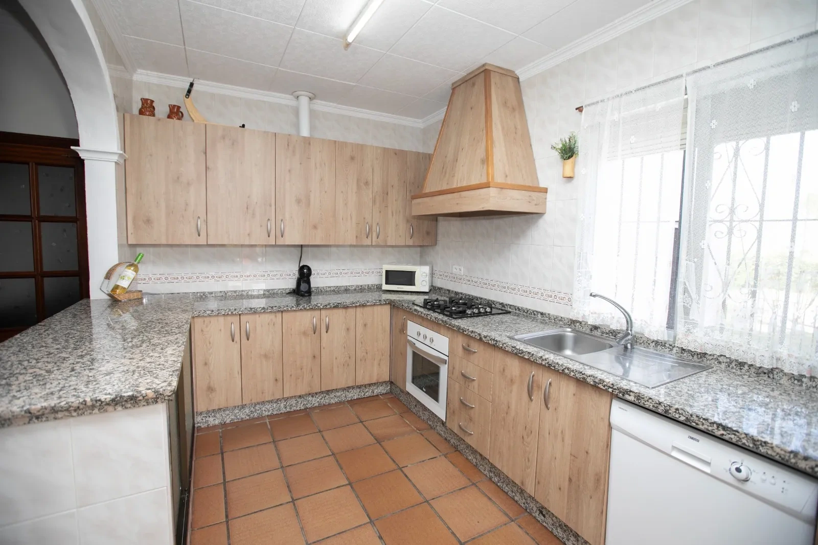 Cocina de El Olmo con encimera en esquina · Casa Rural El Olmo