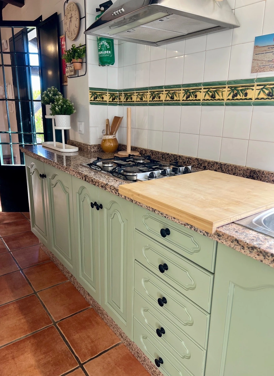 Cocina abierta de Casa El Refugio · Mirador de la Alcaidía