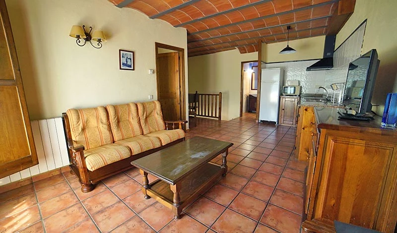 Sala de estar y comedor de uno de los alojamientos