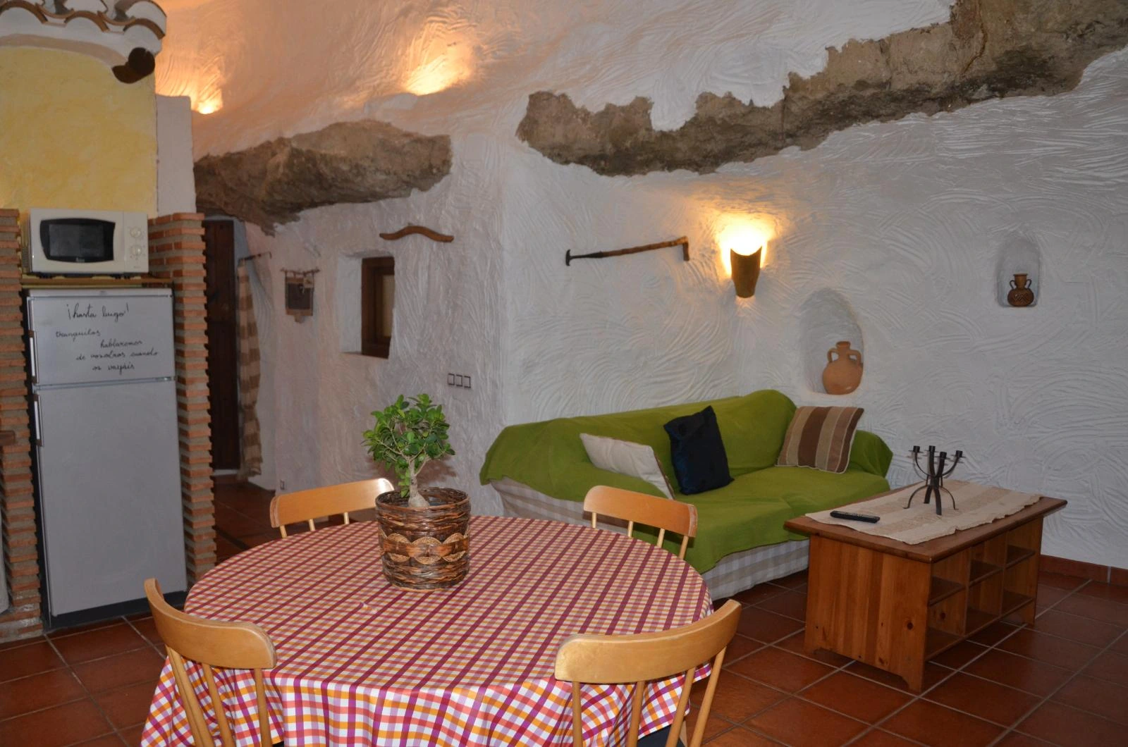 Salón y comedor de El Pajar de la Esperanza. · Casas Cueva El Mirador de Galera