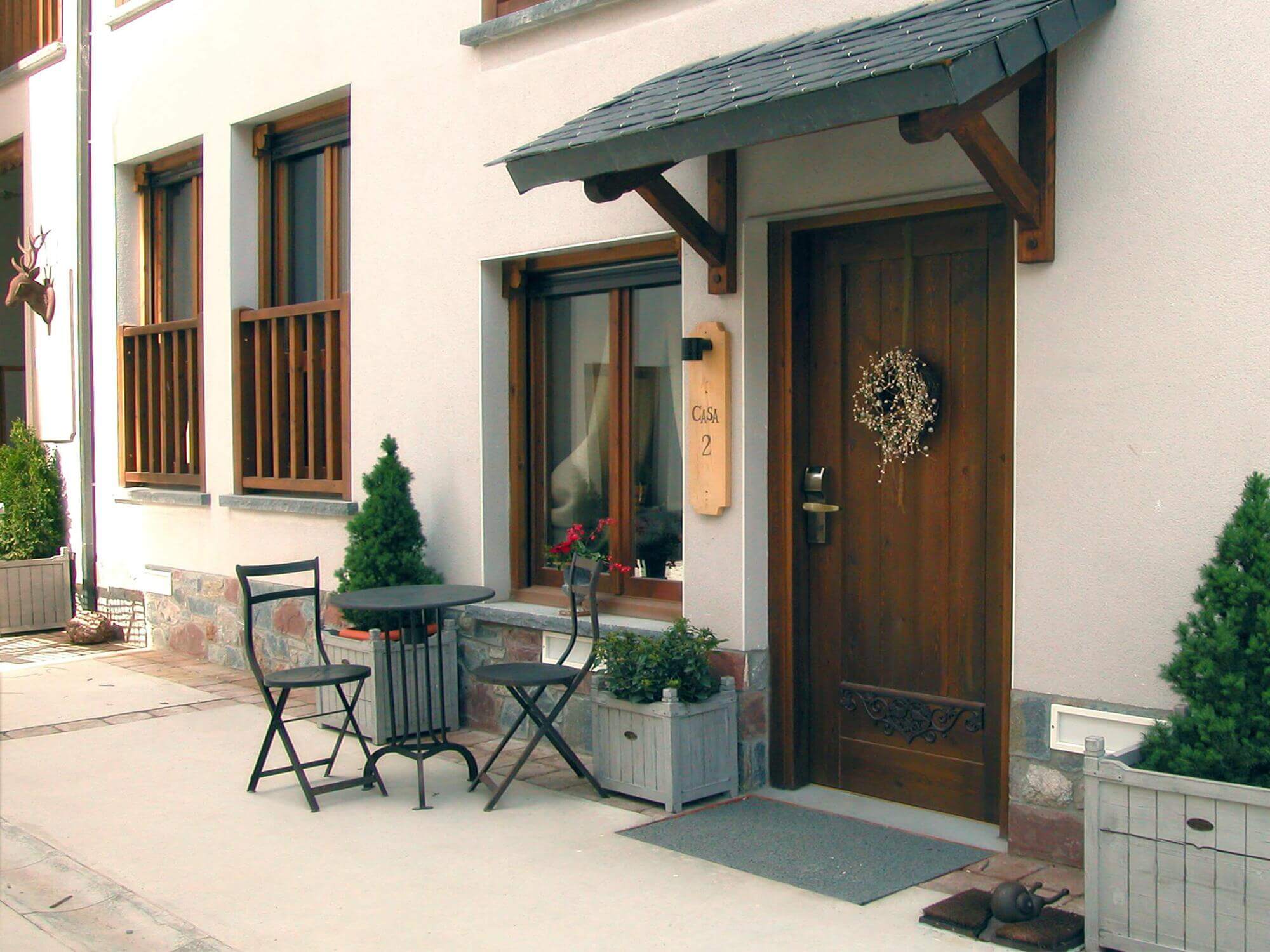Acceso a una de las casas del Hotel Plaza