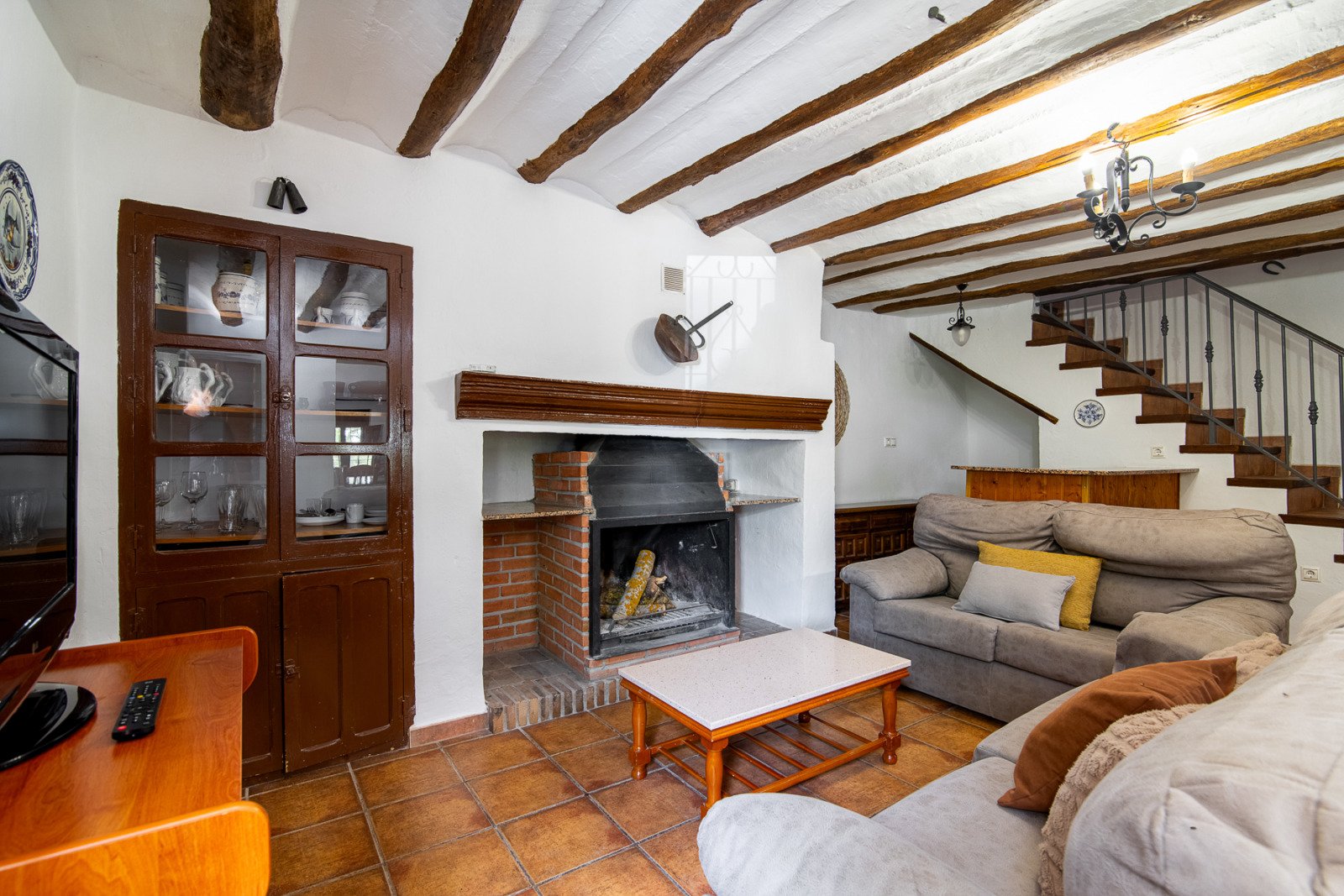 Salón con chimenea de Cortijo Helao