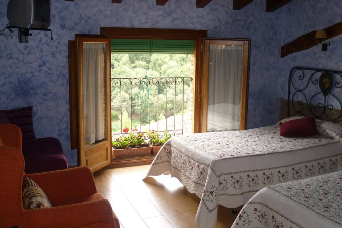 Dormitorio con vistas de Casa Carboneros