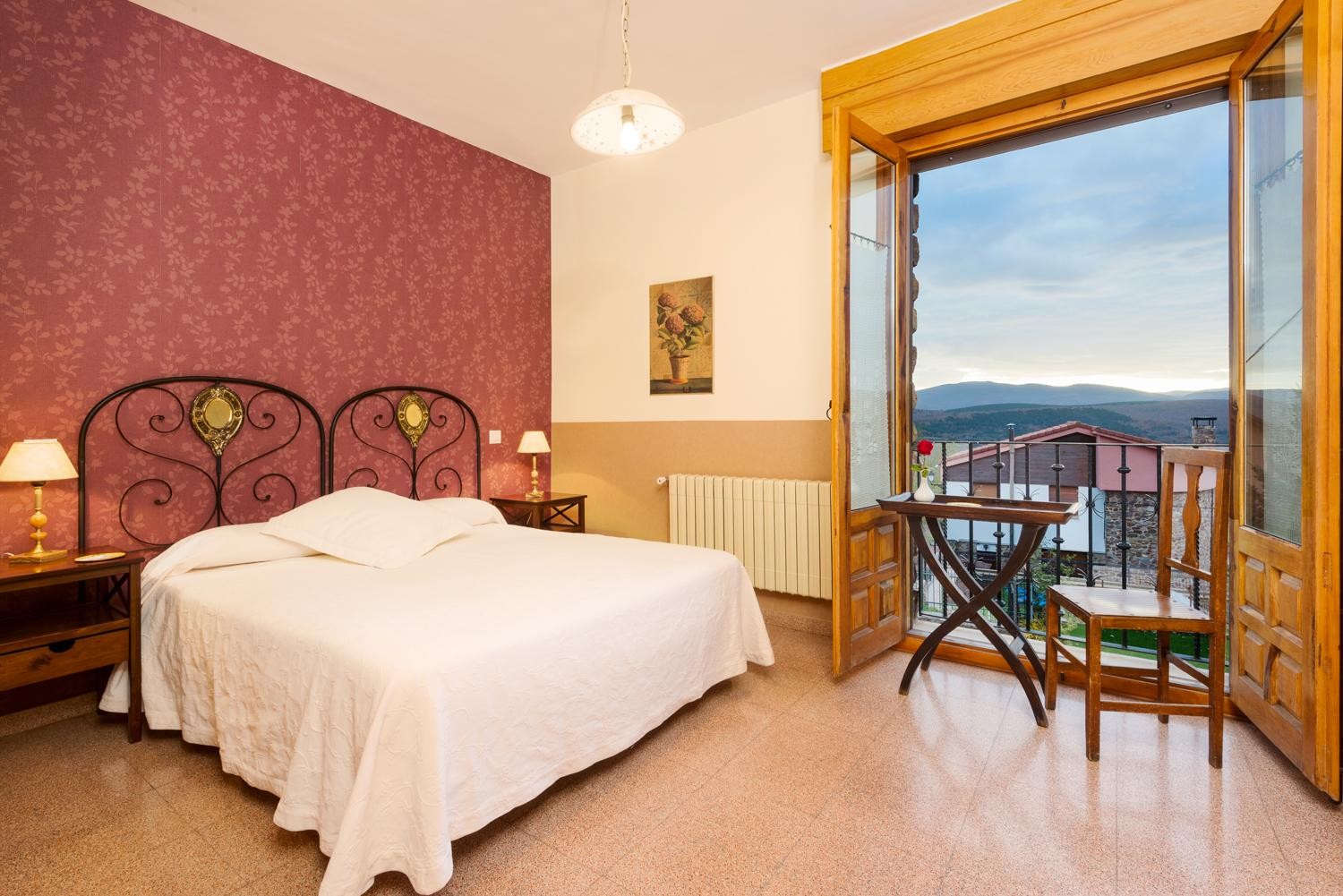 Dormitorio con balcón de Casa Mabe