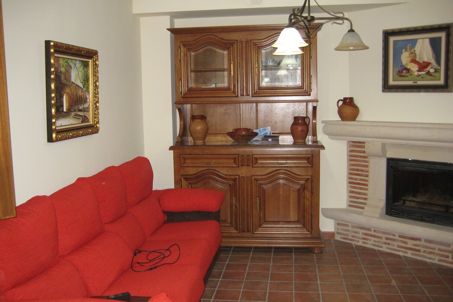 Salón con chimenea de La Posada del Santo