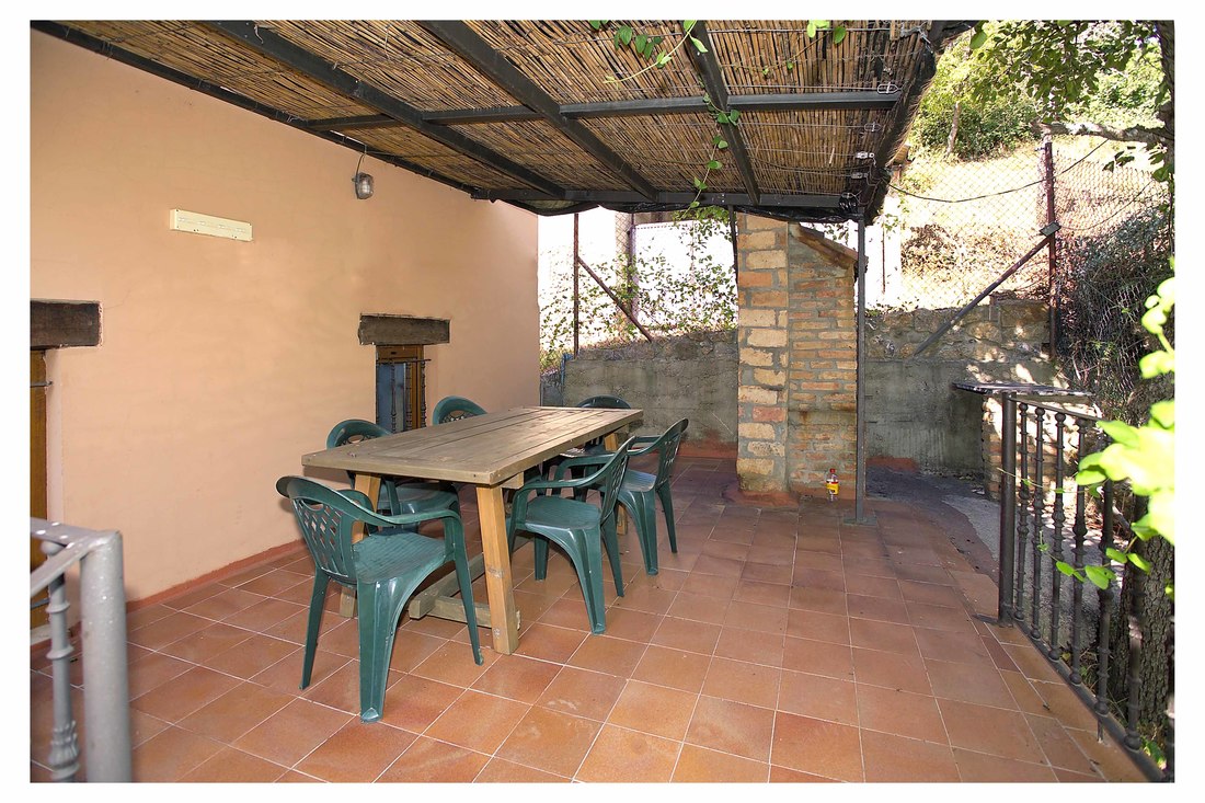 Terraza con barbacoa de Casa Rioloseros