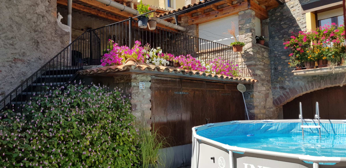 Patio con piscina de Casa Teulé