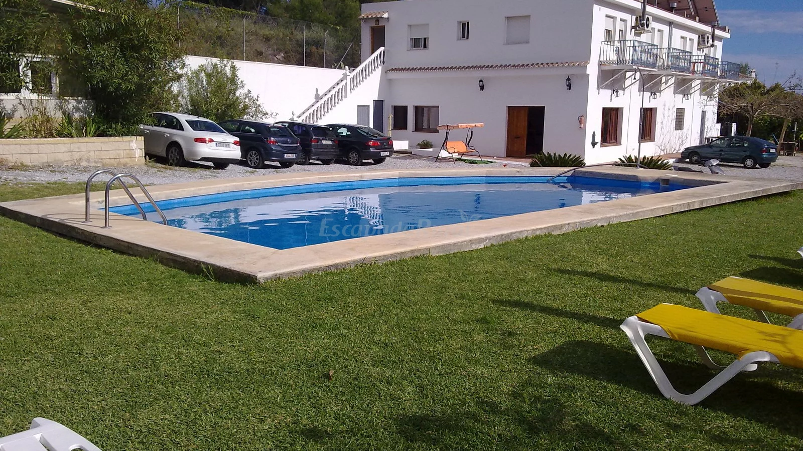 Casas y piscina del Conjunto Rural Las Rosas