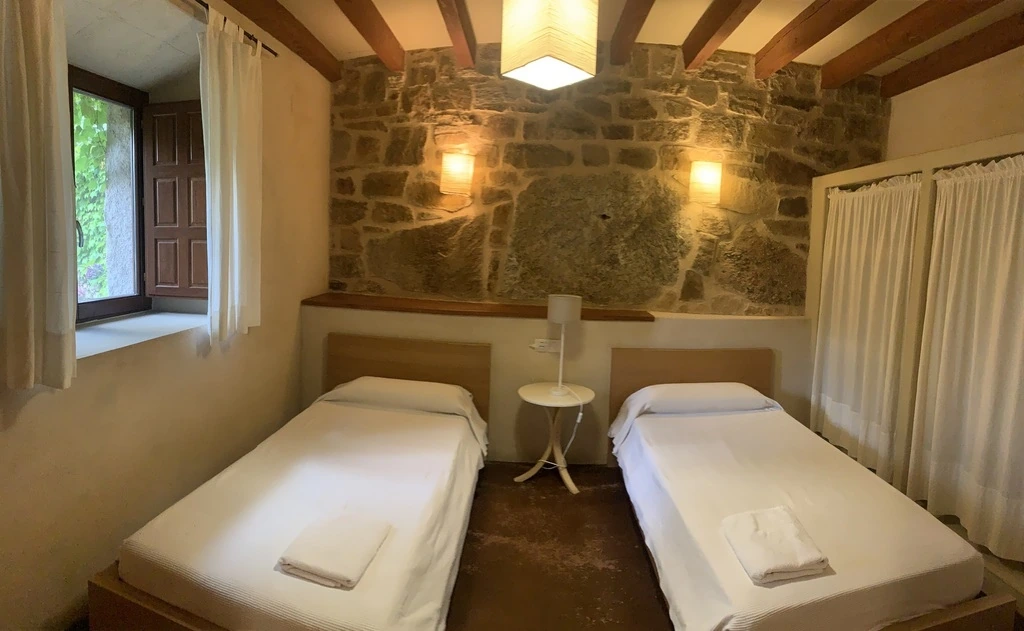 Habitación con dos camas · El Corazón Verde