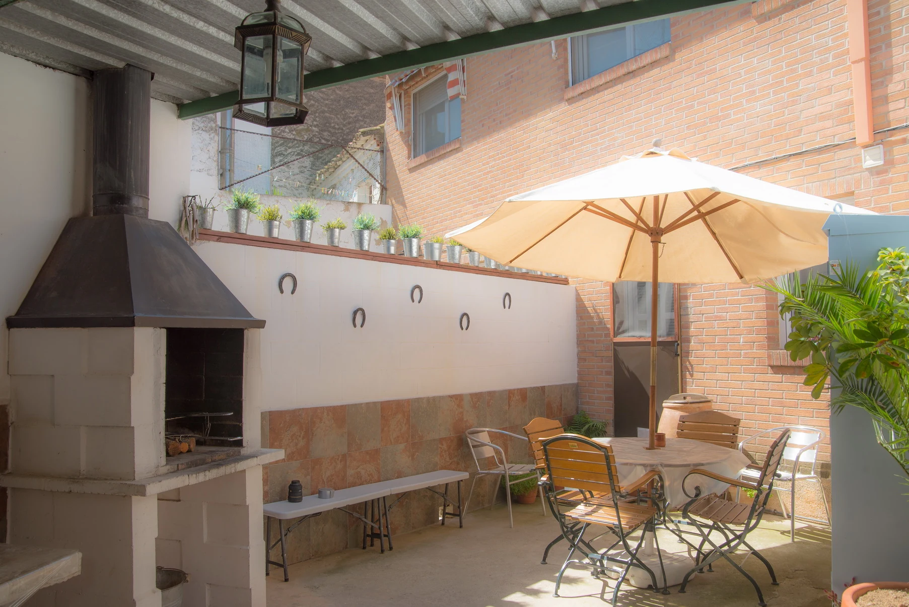 Terraza y barbacoa de Casa El Herrador